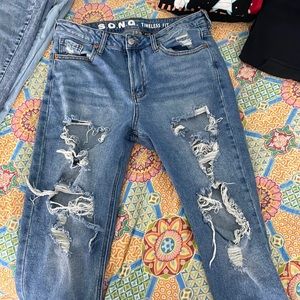ripped song blue denim jeans